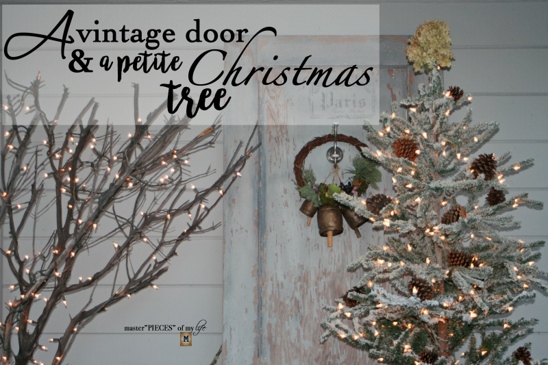 A vintage door & a petite Christmas tree A vintage door & a petite Christmas tree