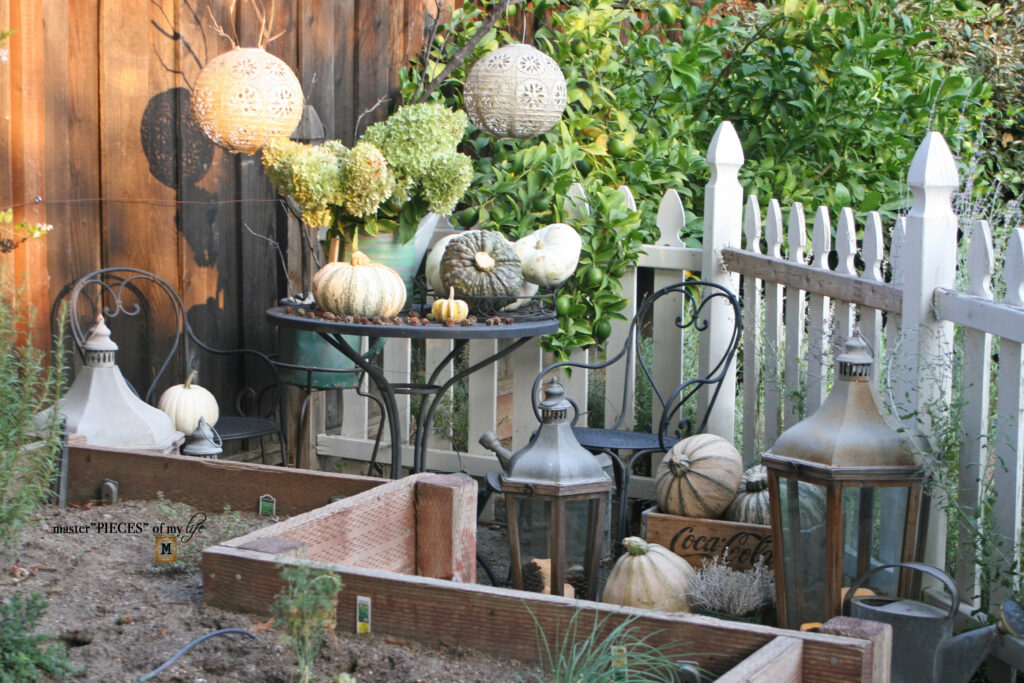 Pretty perch in tthe garden 2 outdoor pumpkin vignette