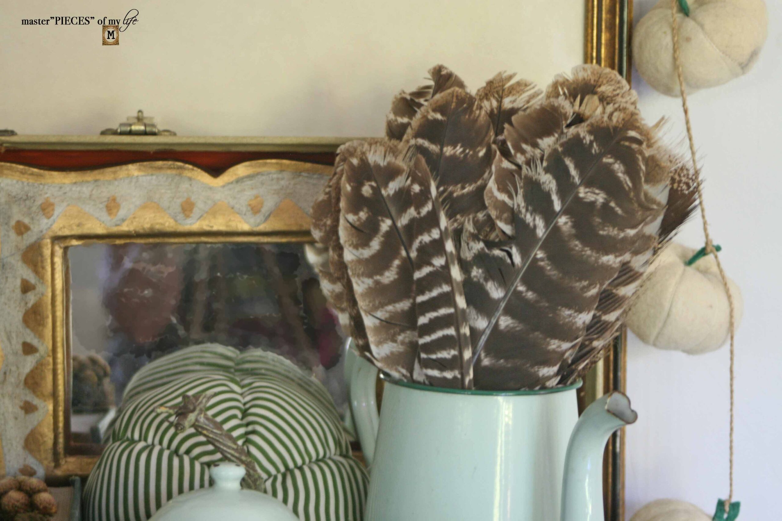 fall vignette in vintage train case
