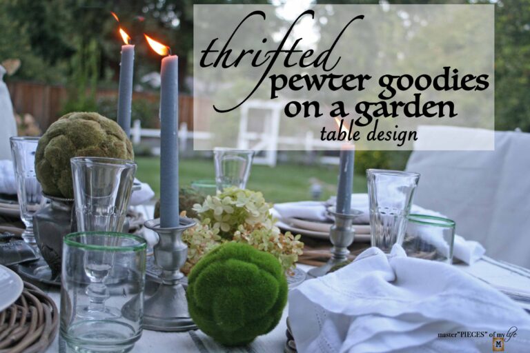 thrifted pewter goodies on a garden table design