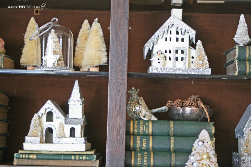 Christmas village styling in an old secretary