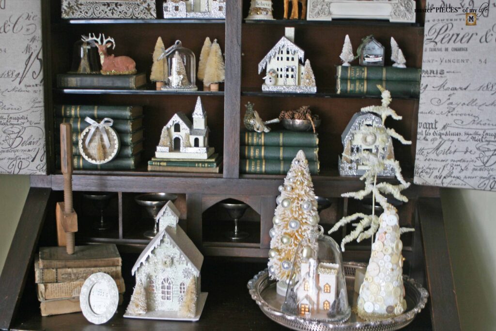 Christmas village styling in an old secretary