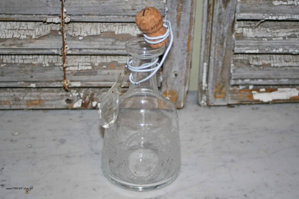 thrifted etched apothecary bottle