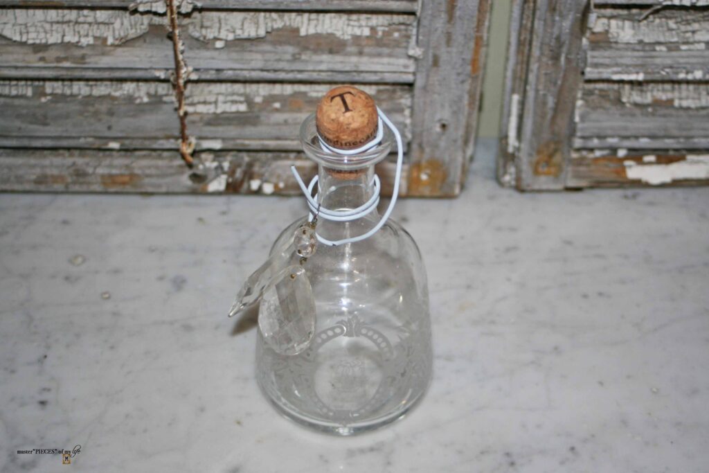 thrifted etched apothecary bottle