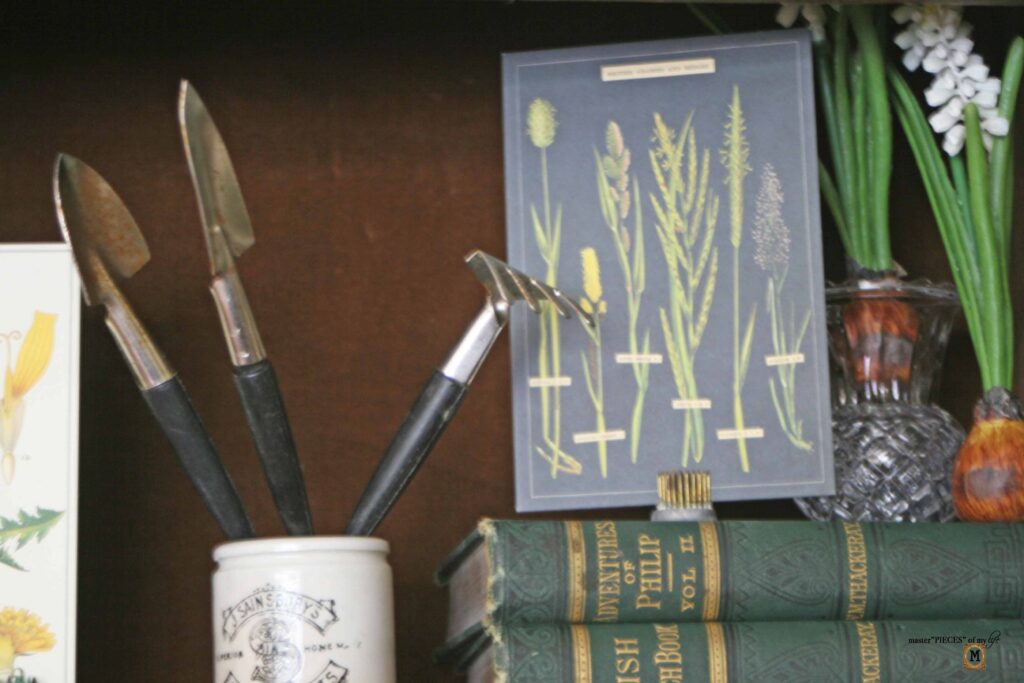 garden decor in an antique secretary desk