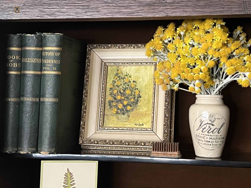 garden decor in an antique secretary desk