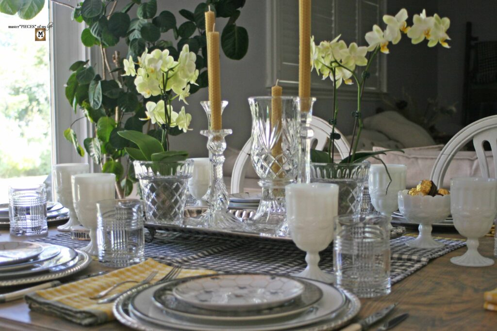 orchid and beeswax candle tablescape