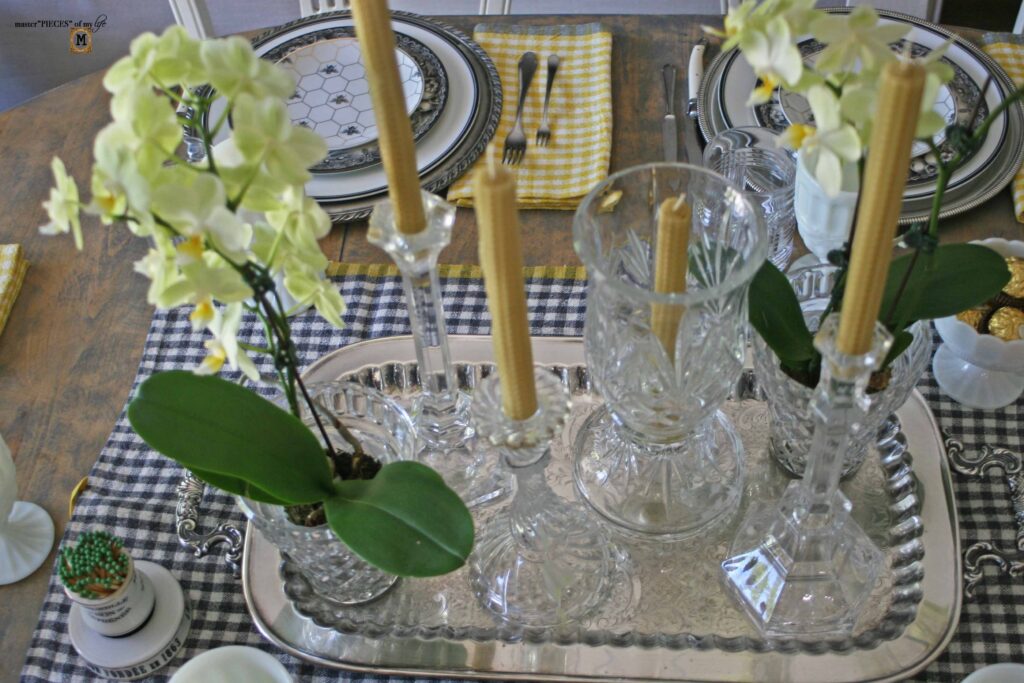 orchid and beeswax candle tablescape