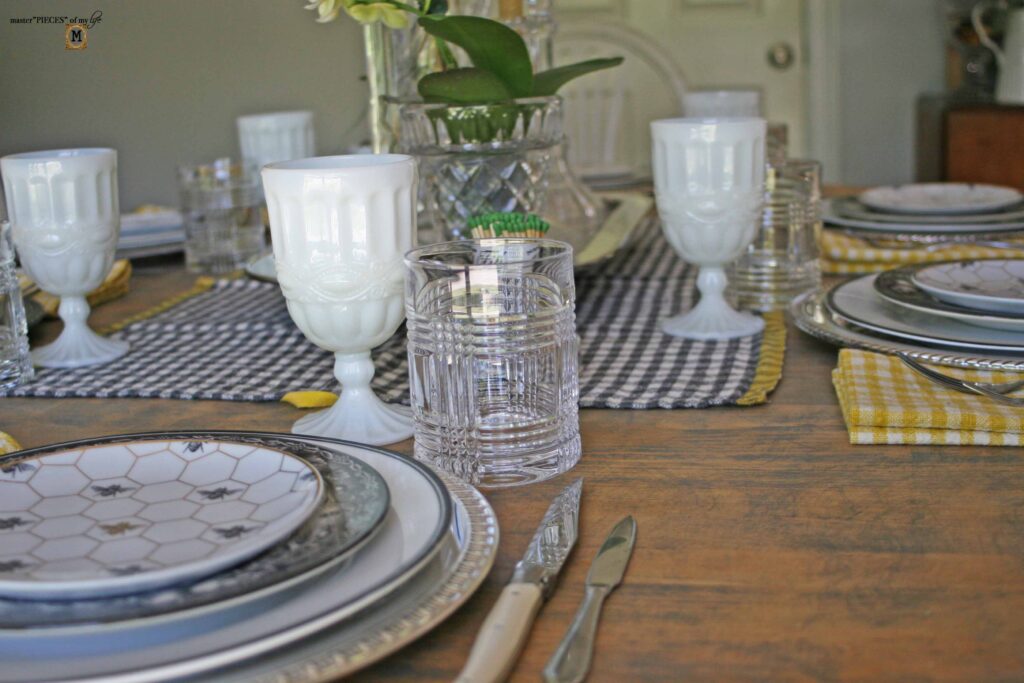 orchid and beeswax candle tablescape