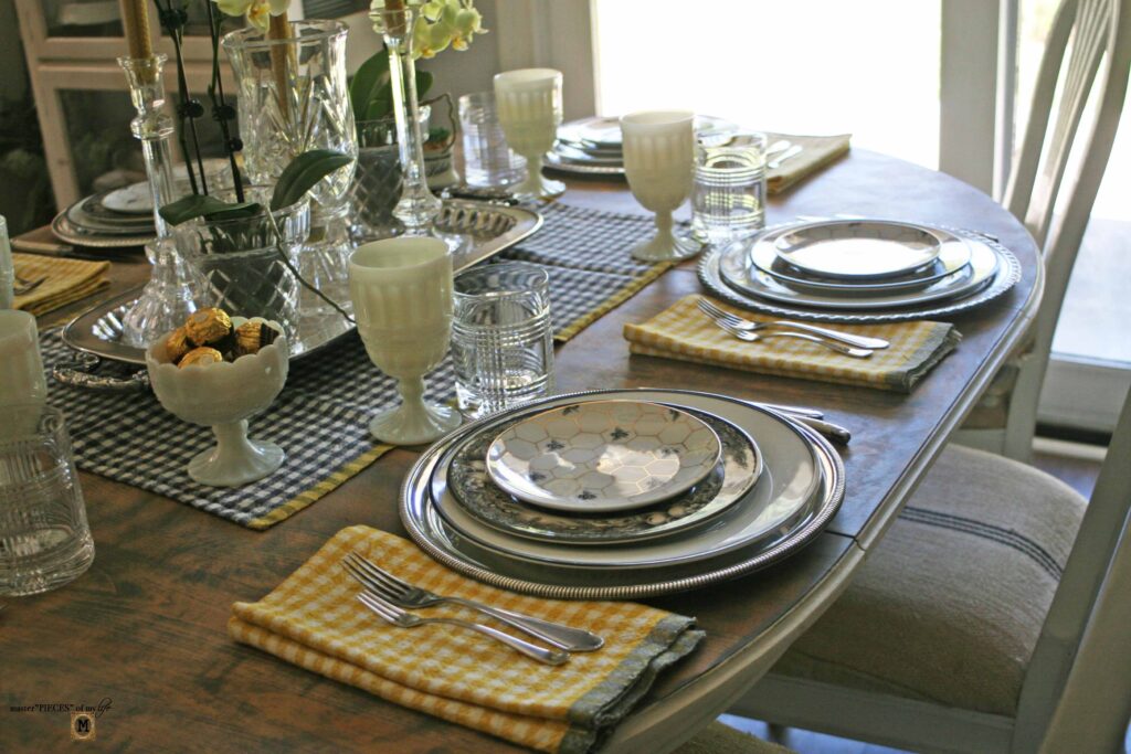 orchid and beeswax candle tablescape