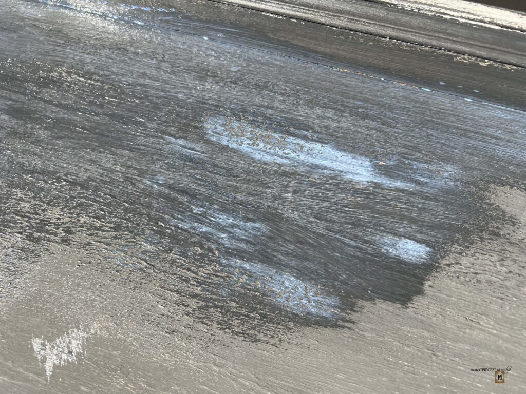 an old, shabby dresser refurbished into an outdoor sideboard