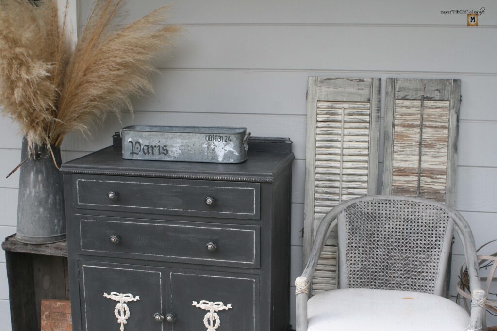 an old, shabby dresser refurbished into an outdoor sideboard
