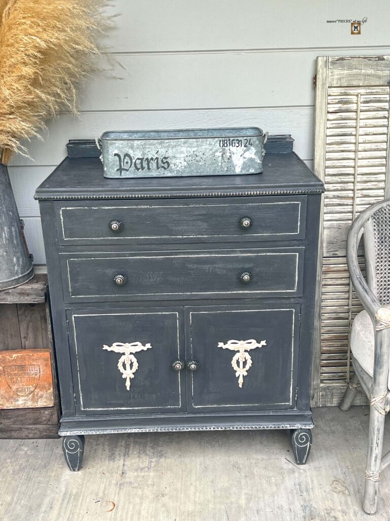 an old, shabby dresser refurbished into an outdoor sideboard