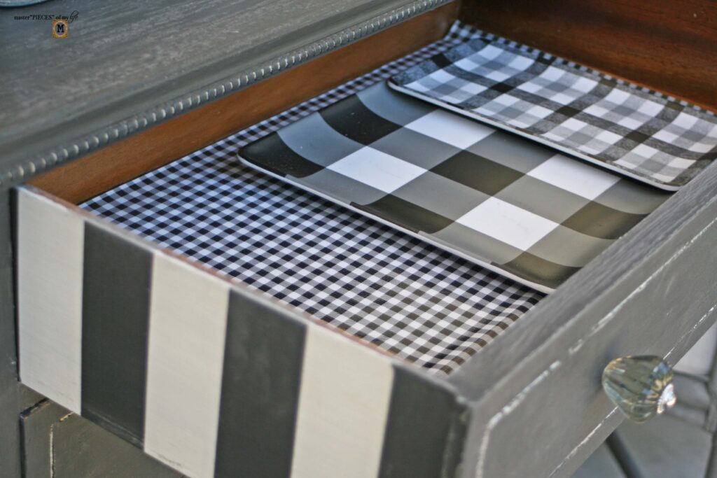 an old, shabby dresser refurbished into an outdoor sideboard