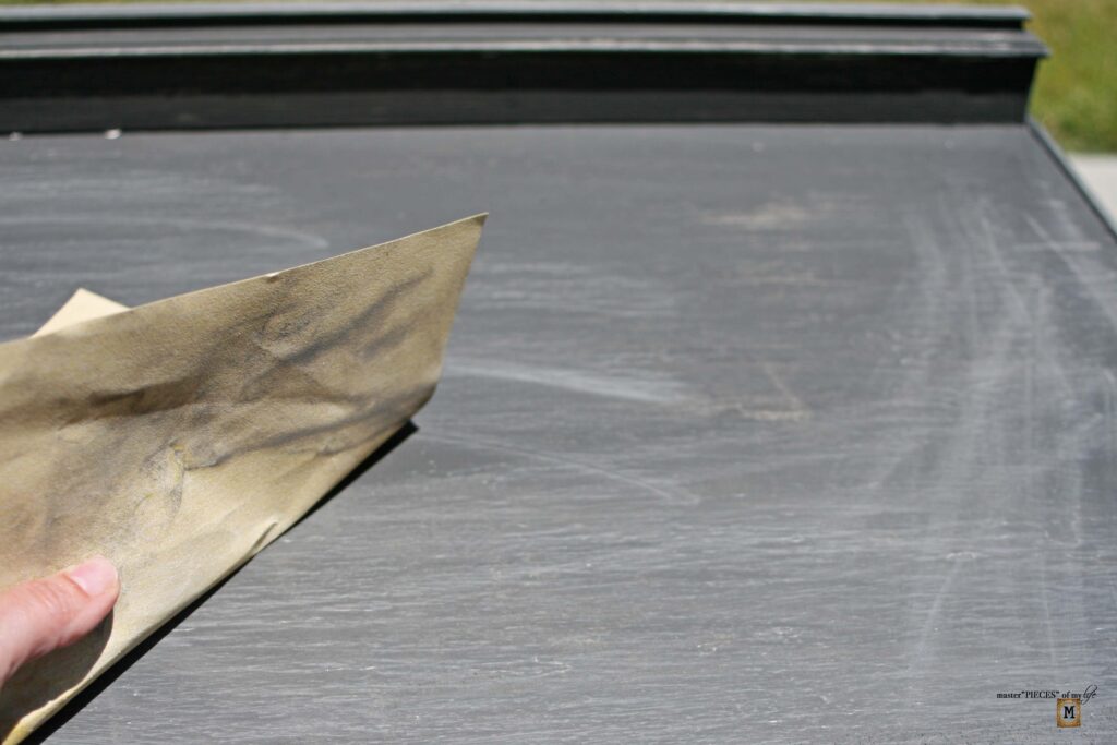 an old, shabby dresser refurbished into an outdoor sideboard