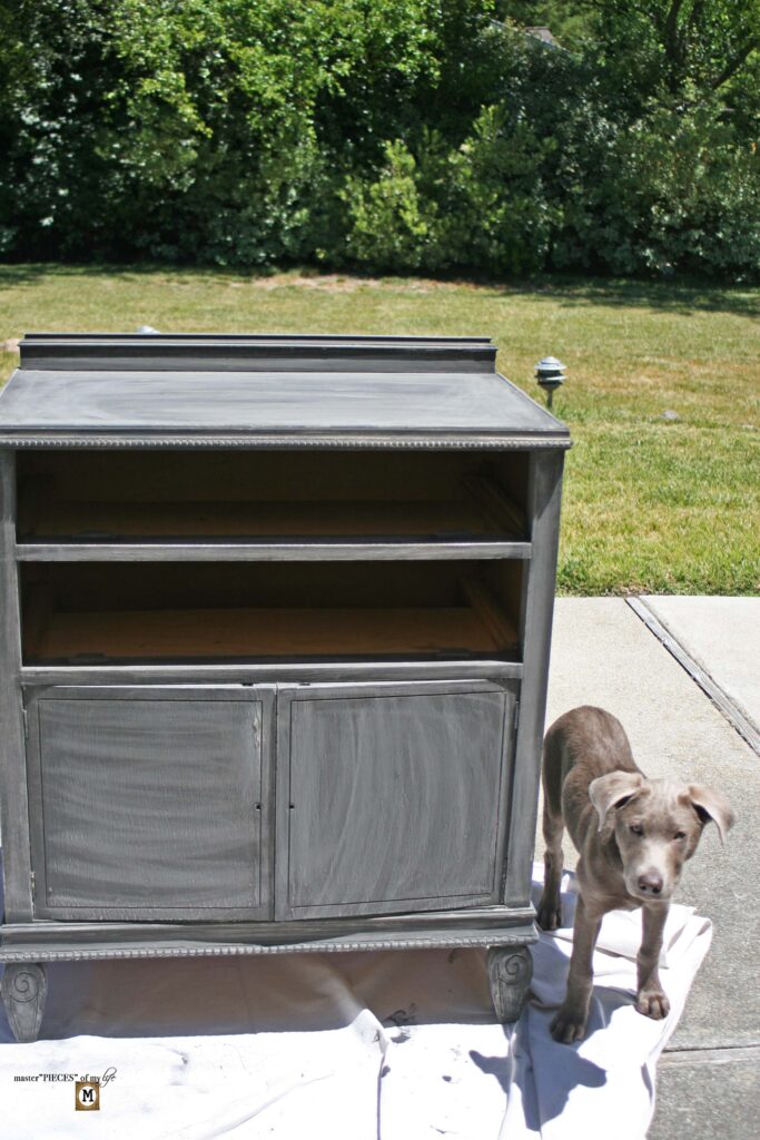 an old, shabby dresser refurbished into an outdoor sideboard