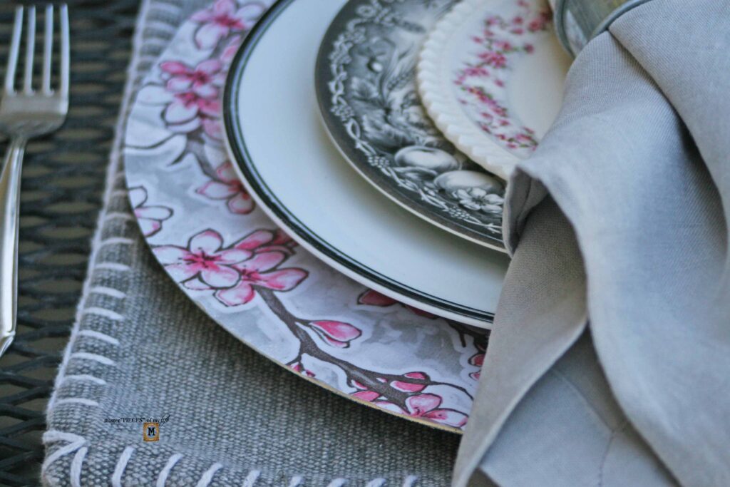 pink floral tablescape with DIIY oilcloth charger