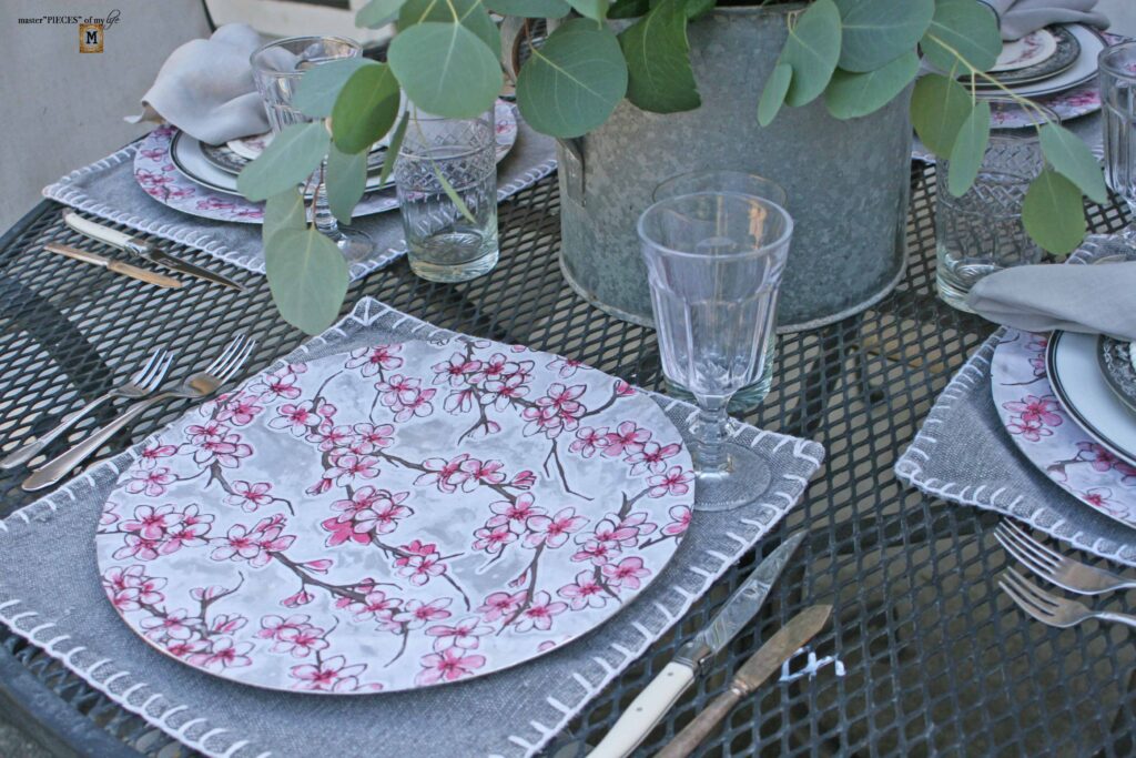 pink floral tablescape with DIIY oilcloth charger
