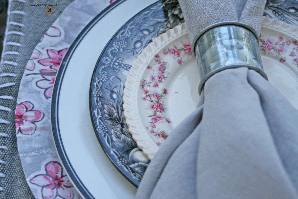 pink floral tablescape with DIIY oilcloth charger