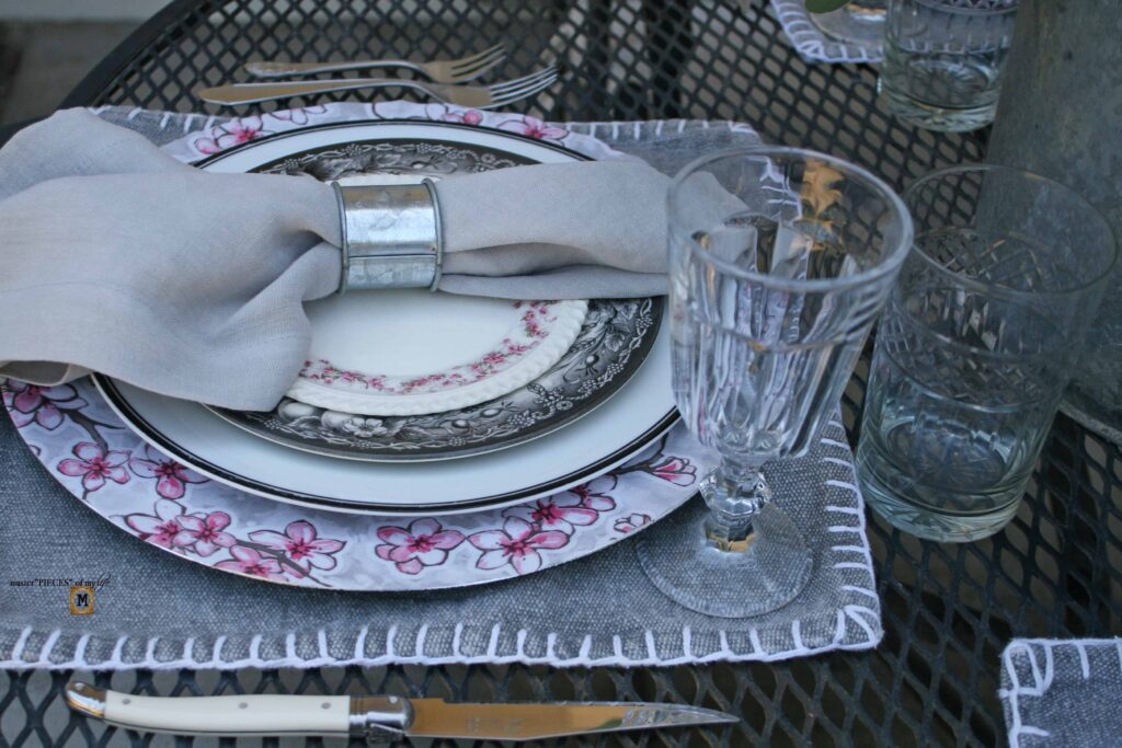 pink floral tablescape with DIIY oilcloth charger