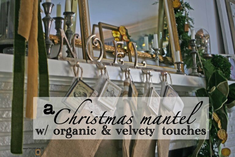 a Christmas mantel with organic & velvety touches