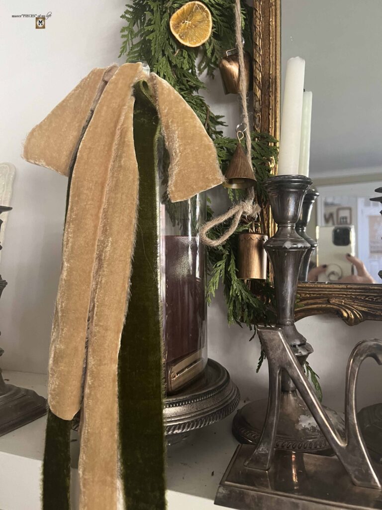 Christmas mantel with velvety ribbon