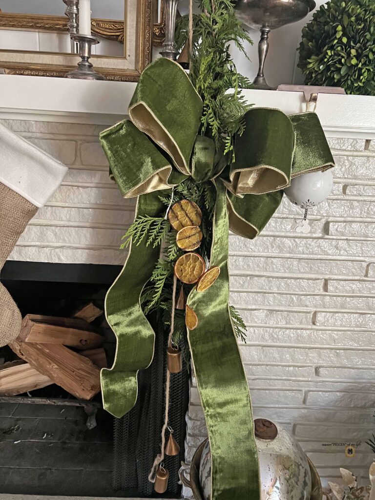 Christmas mantel with velvety ribbon