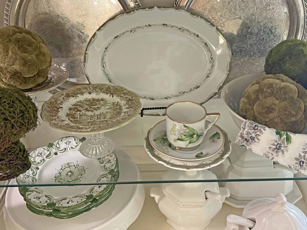 spring green inspired china cabinet decor styling