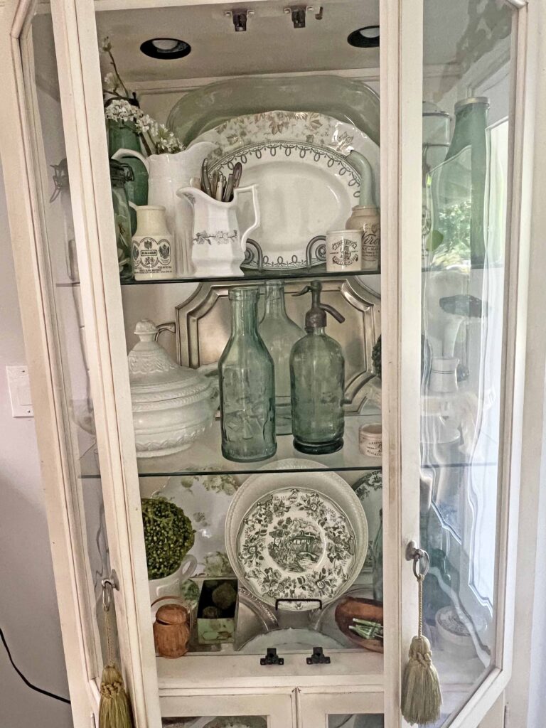 spring green inspired china cabinet decor styling