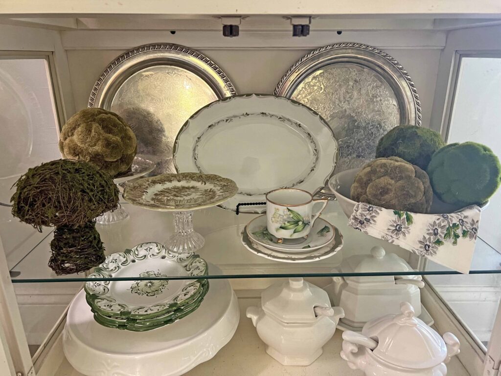 spring green inspired china cabinet decor styling
