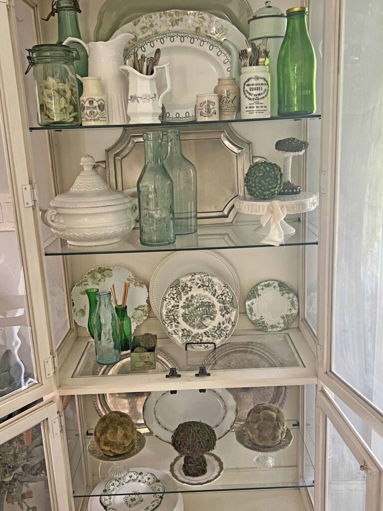 spring green inspired china cabinet decor styling