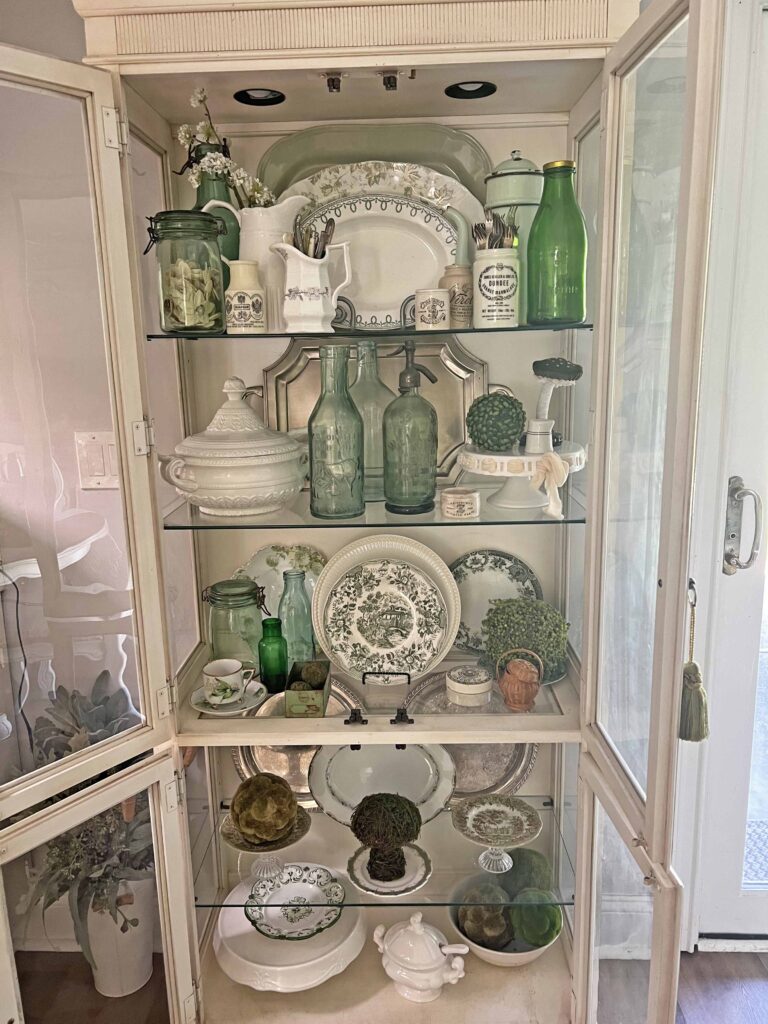 spring green inspired china cabinet decor styling