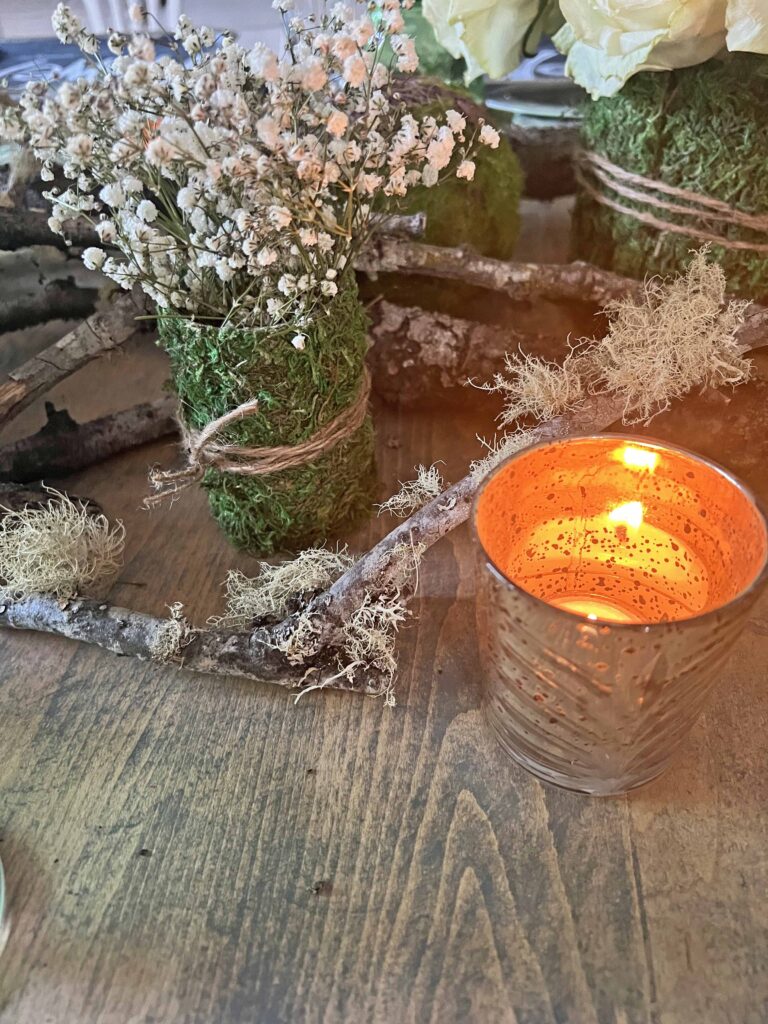 woodsy spring blooming table scape