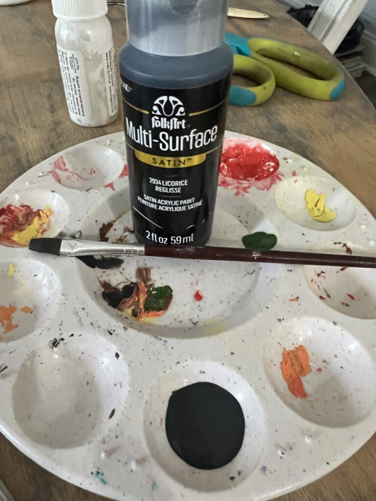 Halloween artwork hacks using Dollar Tree Canvases