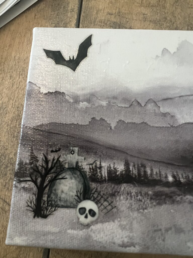 Halloween artwork hacks using Dollar Tree Canvases