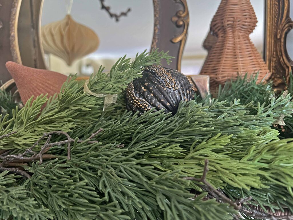 Christmas mantel decorated in neutral browns