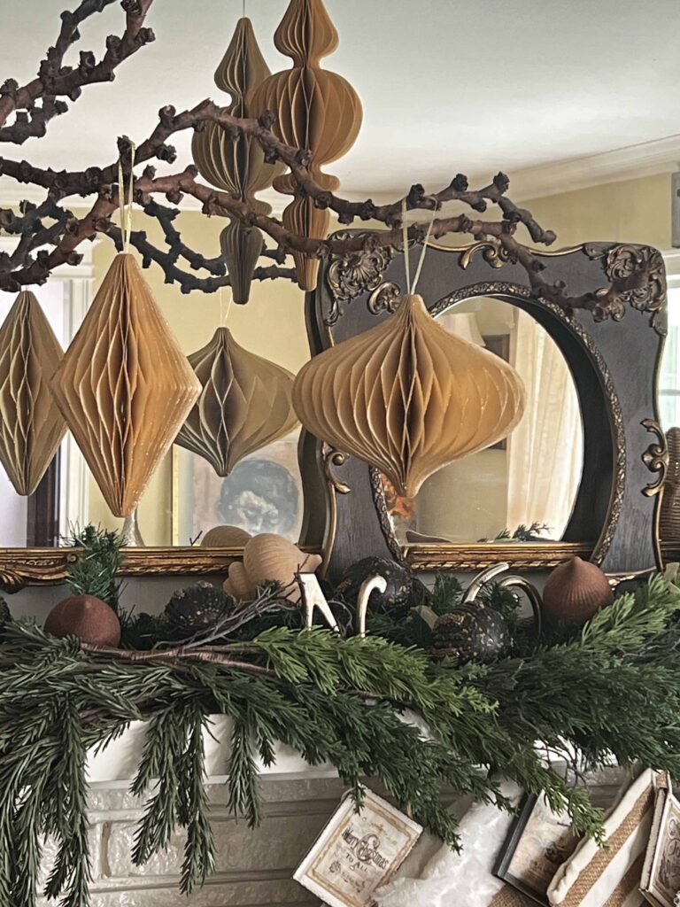 Christmas mantel decorated in neutral browns