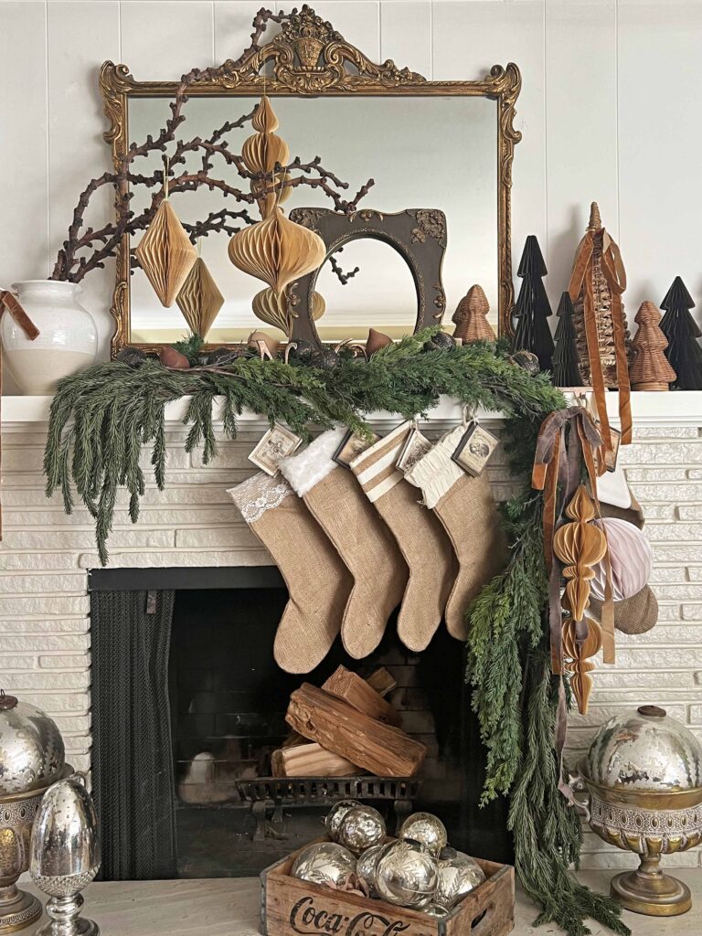 Christmas mantel decorated in neutral browns