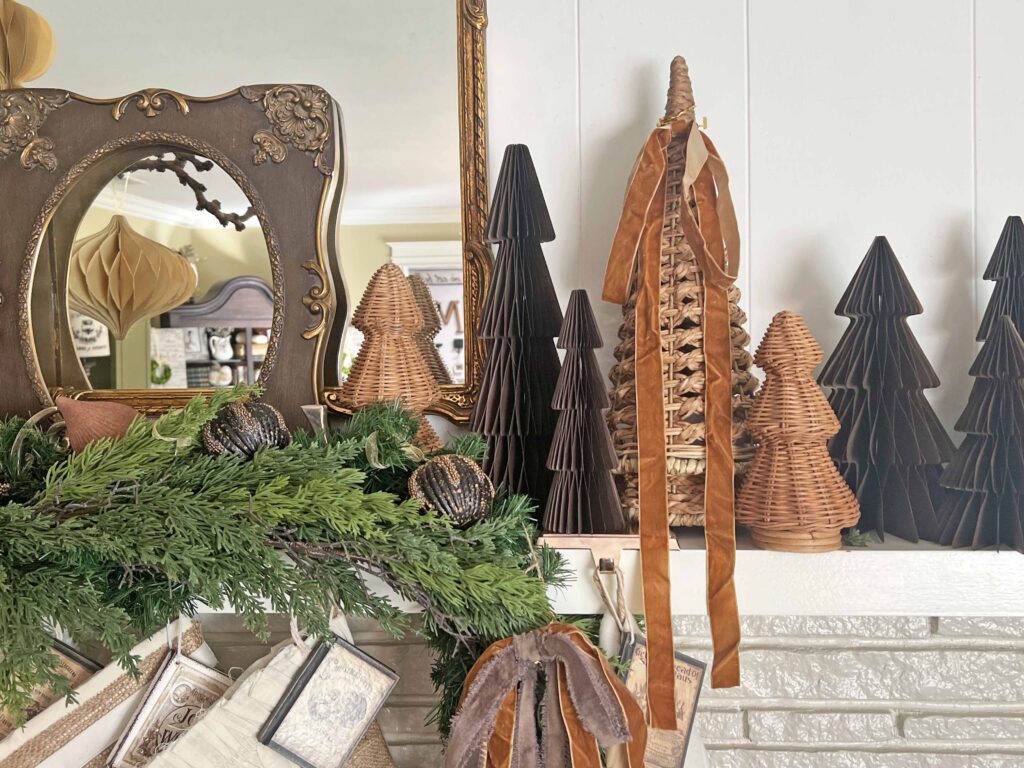 Christmas mantel decorated in neutral browns