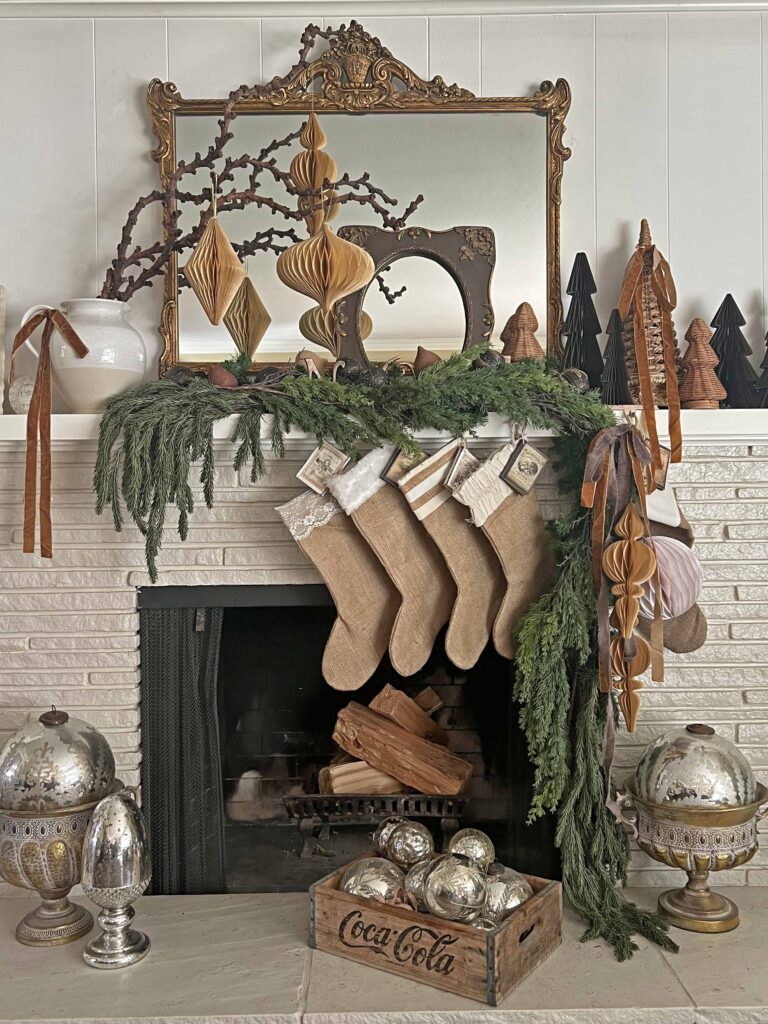 Christmas mantel decorated in neutral browns
