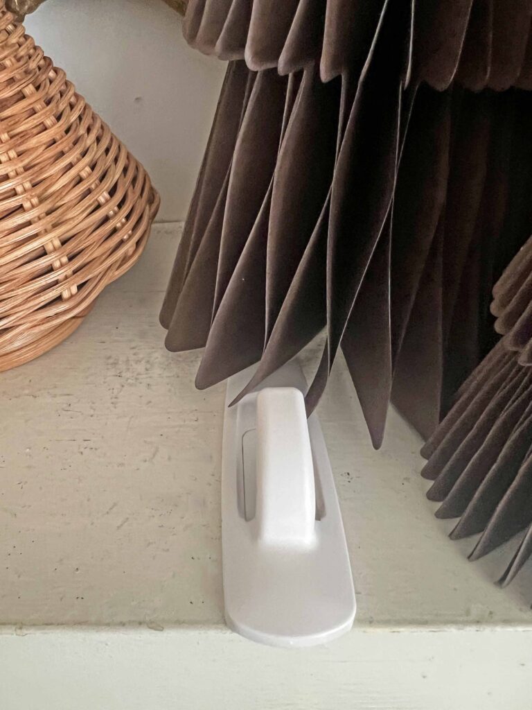 Christmas mantel decorated in neutral browns