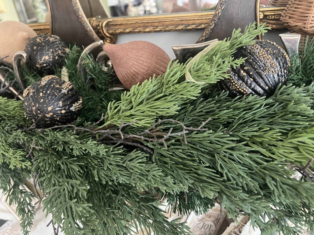 Christmas mantel decorated in neutral browns