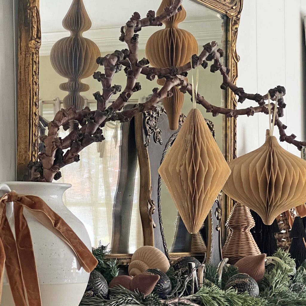 Christmas mantel decorated in neutral browns