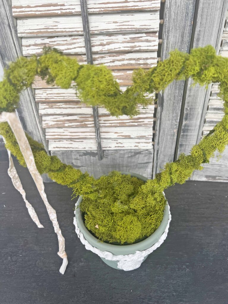 repurpose indoor plant trellis