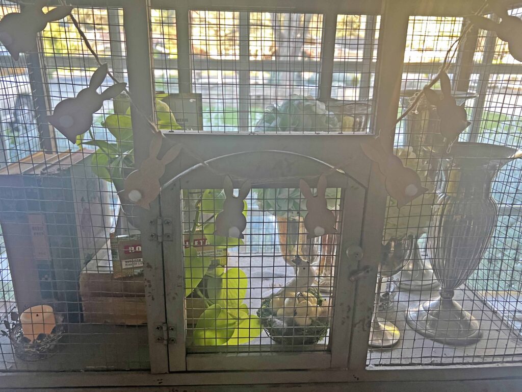 how to style a simple Easter Vignette in an ornamental birdcage