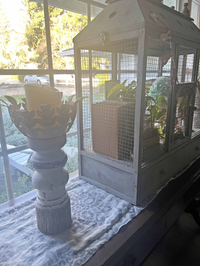 how to style a simple Easter Vignette in an ornamental birdcage