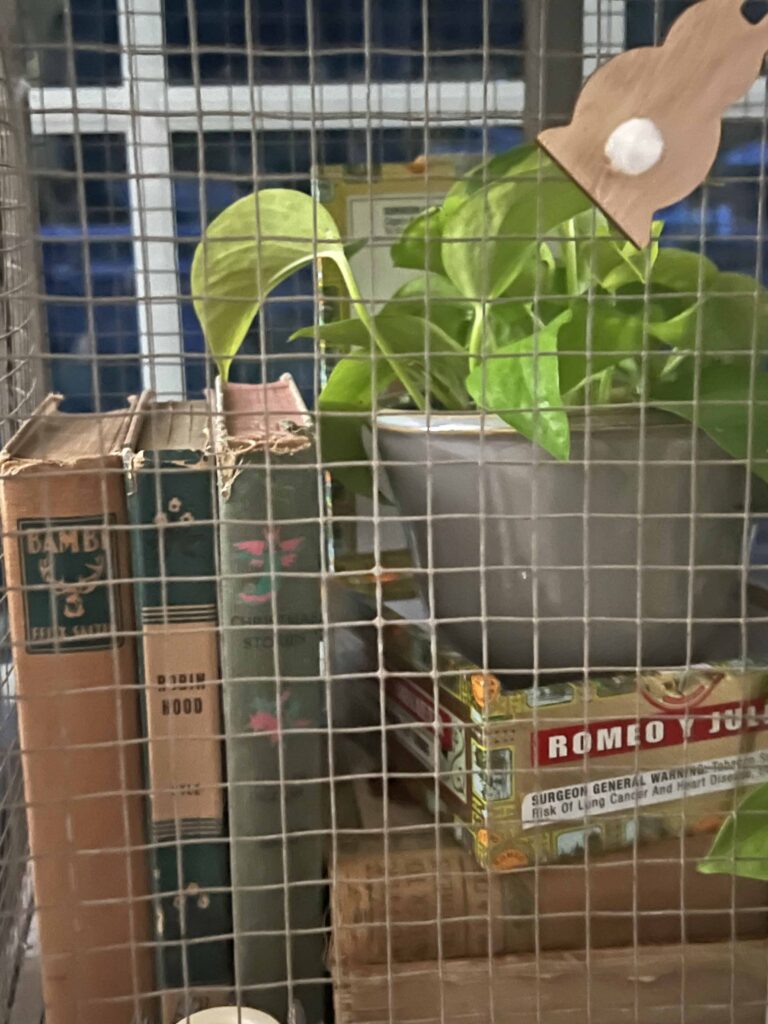 how to style a simple Easter Vignette in an ornamental birdcage