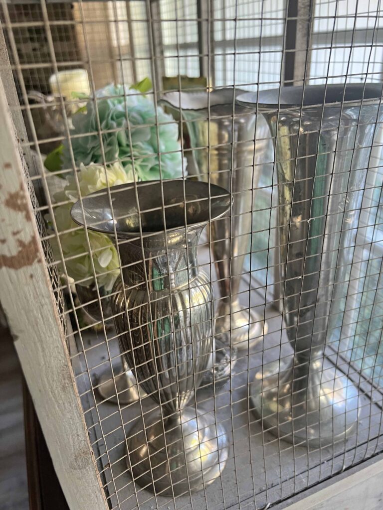 how to style a simple Easter Vignette in an ornamental birdcage