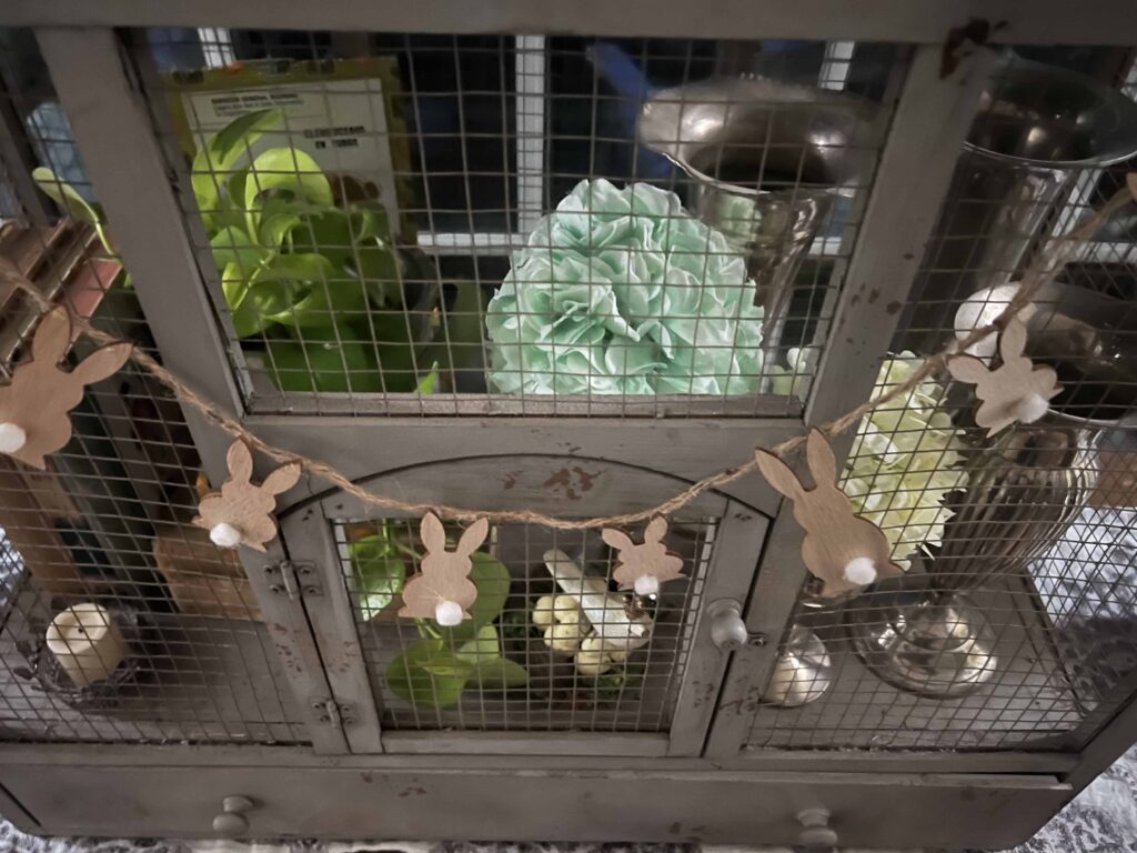 how to style a simple Easter Vignette in an ornamental birdcage