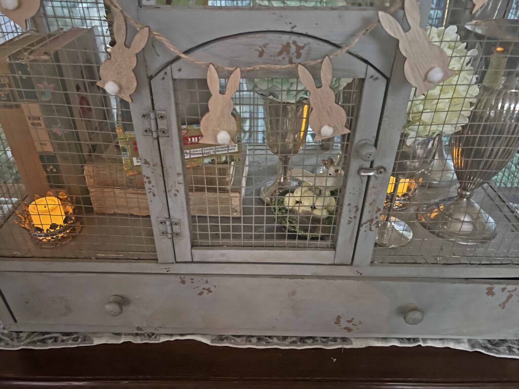 how to style a simple Easter Vignette in an ornamental birdcage